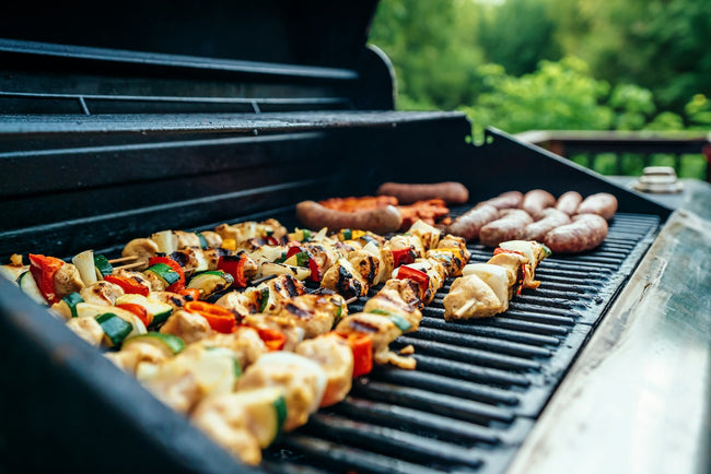 Charcoal grill cooking outdoors - category image