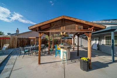 Outdoor dining area with umbrella shade - category image